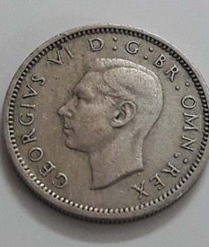 Foreign currency 6 pence British King George VI in 1949-xxp