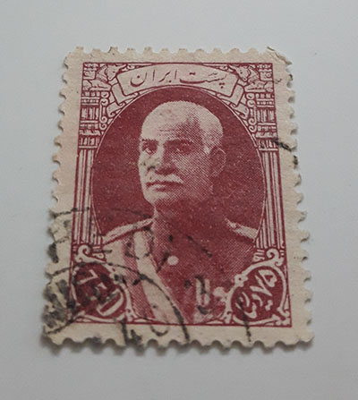 Collectible Iranian stamp of Reza Shah series naked head without French subtitles 75 dinars (red brown)-art