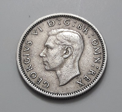 Collectible foreign coins 6 pence British King George VI in 1947-qeq