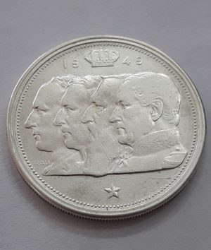 A rare Belgian four-sided collectible silver coin of the year ASDCV